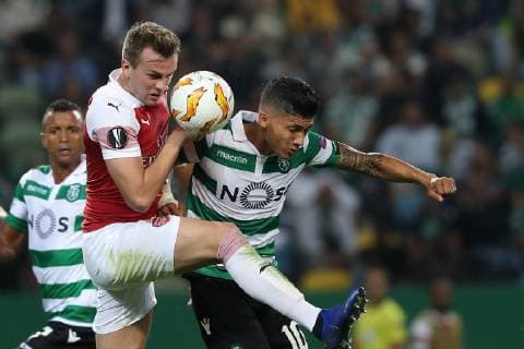 October 25, 2018 - Lisbon, Portugal - Arsenal s defender Rob Holding from England (L) fights for the ball with Sporting s forward Fredy Montero from Colombia during the UEFA Europa League Group E football match Sporting CP vs Arsenal FC at Jose Alvalade stadium in Lisbon, Portugal, on October 25, 2018. Sporting CP v Arsenal - UEFA Europa League - Group E  - ZUMAn230 20181025_zaa_n230_304 Copyright: xPedroxFiuzax