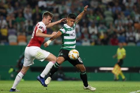 October 25, 2018 - Lisbon, Portugal - Arsenal s defender Rob Holding from England (L) fights for the ball with Sporting s forward Fredy Montero from Colombia during the UEFA Europa League Group E football match Sporting CP vs Arsenal FC at Jose Alvalade stadium in Lisbon, Portugal, on October 25, 2018. Sporting CP v Arsenal - UEFA Europa League - Group E  - ZUMAn230 20181025_zaa_n230_311 Copyright: xPedroxFiuzax