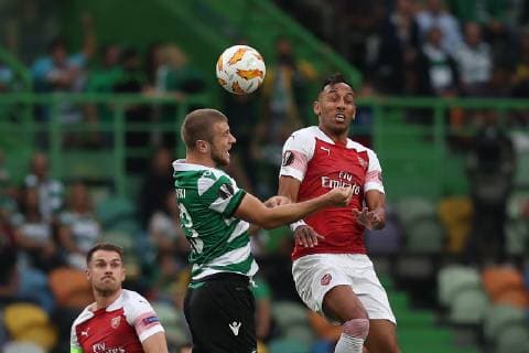 October 25, 2018 - Lisbon, Portugal - Arsenal s forward Pierre Aubameyang from Gabon (R ) fights for the ball with Sporting s defender Stefan Ristovsk from Macedonia (L) during the UEFA Europa League Group E football match Sporting CP vs Arsenal FC at Jose Alvalade stadium in Lisbon, Portugal, on October 25, 2018. Sporting CP v Arsenal - UEFA Europa League - Group E  - ZUMAn230 20181025_zaa_n230_285 Copyright: xPedroxFiuzax
