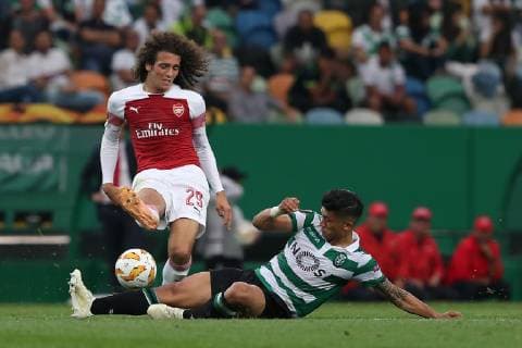 October 25, 2018 - Lisbon, Portugal - Arsenal s midfielder Matteo Guendouzi from France (L) vies with Sporting s forward Fredy Montero from Colombia (R ) during the UEFA Europa League Group E football match Sporting CP vs Arsenal FC at Jose Alvalade stadium in Lisbon, Portugal, on October 25, 2018. Sporting CP v Arsenal - UEFA Europa League - Group E  - ZUMAn230 20181025_zaa_n230_239 Copyright: xPedroxFiuzax