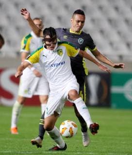 (181026) -- NICOSIA, Oct. 26, 2018 -- Jorge Larena (L) of AEK Larnaca vies with Marcelinho of Ludogorets during the Europa League Group A match between AEK Larnaca and Ludogorets in Nicosia, Cyprus on Oct. 25, 2018. The match tied 1-1. ) (SP)CYPRUS-NICOSIA-SOCCER-UEFA EUROPA LEAGUE-AEK LARNACA VS LUDOGORETS SakisxSavvides 