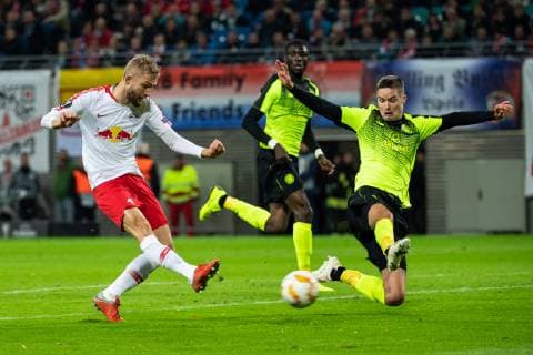 (181026) -- LEIPZIG, Oct. 26, 2018 -- Leipzig s Konrad Laimer (L) takes a shot during a third round match in Group B of UEFA Europa League between RB Leipzig of Germany and Celtic FC of Scotland, in Leipzig, Germany, on Oct. 25, 2018. Leipzig won 2-0. ) (SP)GERMANY-LEIPZIG-SOCCER-UEFA EUROPA LEAGUE-LEIPZIG VS CELTIC KevinxVoigt 