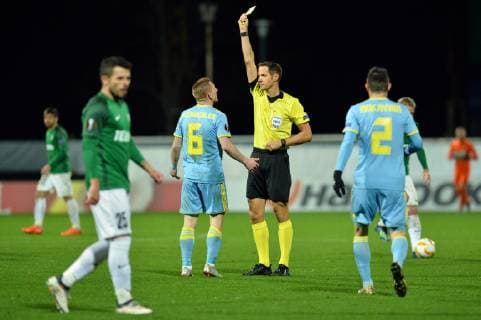 Referee Robert Schorgenhofer gives a yellow card to Laszlo Kleinheisler (Astana) during the 3rd round of the European UEFA Europa League, match FK Jablonec vs FC Astana, in Jablonec nad Nisou, Czech Republic, on October 25, 201878. (CTKxPhoto VitxCerny) CTKPhotoP201810251295701  CEV 14
