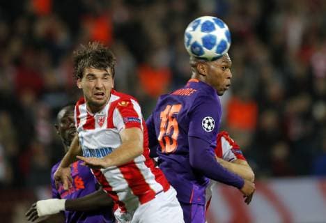 (181107) -- BELGRADE, Nov. 7, 2018 -- Crvena Zvezda s Filip Stojkovic (L) vies with Liverpool s Daniel Sturridge during UEFA Champions League group C football match between Crvena Zvezda and Liverpool in Belgrade, Serbia on Nov. 6, 2018. Crvena Zvezda won 2-0. ) (SP)SERBIA-BELGRADE-FOOTBALL-UEFA-CRVENA ZVEZDA VS LIVERPOOL PredragxMilosavljevic 