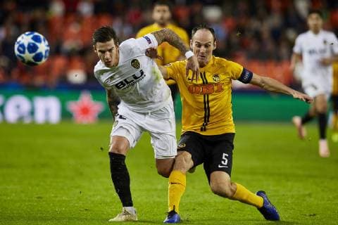 7th November 2018, Mestalla Stadium, Valencia, Spain; UEFA Champions League football, Valencia versus Young Boys; Forward Santi Mina of Valencia CF takes on Defender Steve von Bergen of Young Boys  ActionPlus12077036 IvanxArlandis