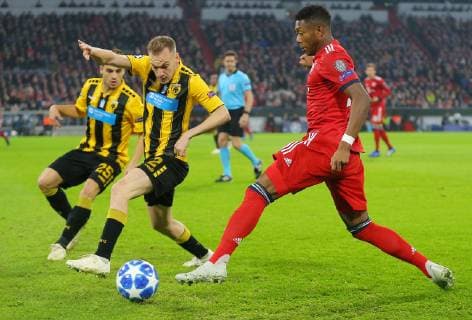 SOCCER - UEFA CL, Bayern vs AEK MUNICH,GERMANY,07.NOV.18 - SOCCER - UEFA Champions League, group stage, FC Bayern Muenchen vs AEK Athen. Image shows Kostas Galanopoulos, Michalis Bakakis (Athen) and David Alaba (Bayern). GEPAxpictures xThomasxBachun