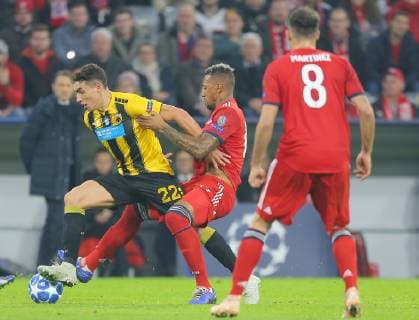 SOCCER - UEFA CL, Bayern vs AEK MUNICH,GERMANY,07.NOV.18 - SOCCER - UEFA Champions League, group stage, FC Bayern Muenchen vs AEK Athen. Image shows Ezequiel Ponce (Athen), Jerome Boateng and Javi Martinez (Bayern). GEPAxpictures xThomasxBachun