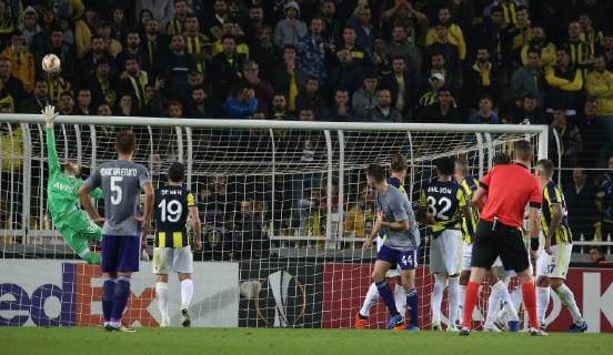 Goalkeeper Harun Tekin of Fenerbahce and Antonio Milic of Anderlecht during the UEFA Europa League groupD match between Fenerbahce and Anderlecht at Ulker Stadium in Istanbul , Turkey on November 08 , 2018. 