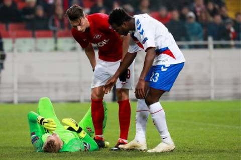 MOSCOW, RUSSIA - NOVEMBER 8, 2018: Spartak Moscow s goalkeeper Alexander Maximenko, Ilya Kutepov, and Rangers Glasgow s Lassana Coulibaly (L-R) in their 2018 19 UEFA Europa League Group G Round 4 football match at Otkrytie Arena. Sergei Fadeichev TASS  TS096BD0