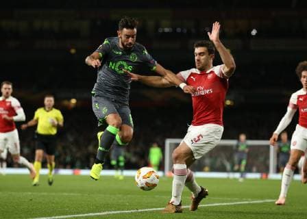 8th November 2018, Emirates Stadium, London, England; UEFA Europa League football, Arsenal versus Sporting Lisbon; Bruno Fernandes of Sporting Lisbon challenges Sokratis Papastathopoulos of Arsenal  ActionPlus12077756 JohnxPatrickxFletcher