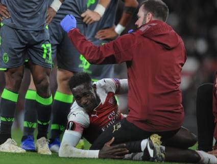 Football - 2018 2019 UEFA Europa League - Group E: Arsenal vs. Sporting Lisbon Danny Welbeck does down in pain with a bad ankle injury which ended his match, at The Emirates. COLORSPORT ANDREW COWIE 