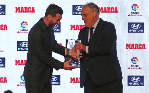November 12, 2018 - Barcelona, Catalonia, Spain - President of La Liga, Javier Tebas (R), gives Barcelona s Argentinian forward Lionel Messi the Alfredo Di Stefano trophy for the 2017-18 best player of the Spanish Liga, during the presentation of the Football Marca Awards in Barcelona on November 12, 2018. Leo Messi Receives The Trophy For The Best Player 2017-18  - ZUMAn230 20181112_zaa_n230_258 Copyright: xJoanxVallsx