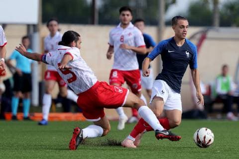Maxence Caqueret (R) of France Under-19 and Dejan Debono (L) of Malta Under-19 during the UEFA Under-19 Championship 2019 Qualifying Group 6 match between France and Malta at the Centenary Stadium, Ta Qali, Malta on 14 November 2018. France U19 v Malta U19 MLT_FRA_U19_18