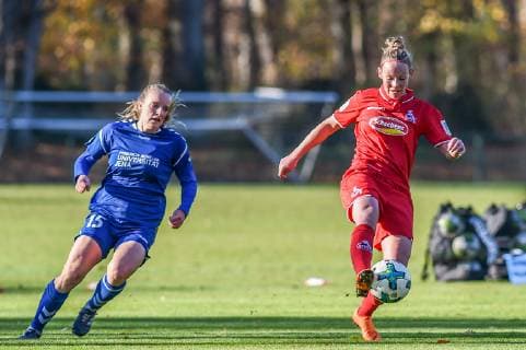 v.li. Anna Lena Riedel (FF USV Jena, 15), Romina Frommont (FC Köln, 23), Zweikampf, Duell, duel, tackle, tackling, Dynamik, Action, Aktion, Fussball, 2. Frauen-Bundesliga, 1. FC Köln - FF USV Jena, DFB REGULATIONS PROHIBIT ANY USE OF PHOTOGRAPHS AS IMAGE SEQUENCES AND OR QUASI-VIDEO.