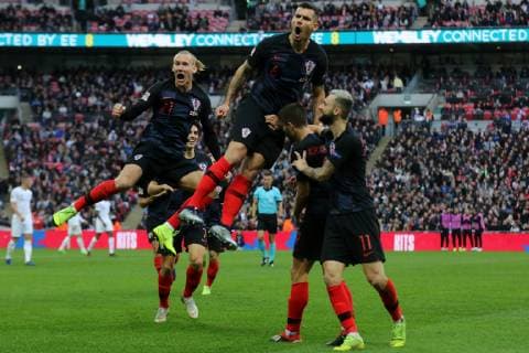 Domagoj Vida and Dejan Lovren celebrate by jumping for joy after Andrej Kramaric scores Croatia s opening goal during the Nations League A Group 4 international match L?nderspiel between England and Croatia at Wembley Stadium, London, England on 18 November 2018. Copyright: xPaulxDennisx PMI-2412-0014
