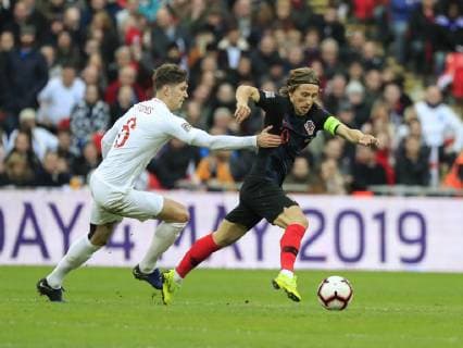 18th November 2018, Wembley Stadium, London, England; UEFA Nations League football, England versus Croatia; Luka Modric of Croatia tries to escape the attention of John Stones of England  ActionPlus12081220 ConorxMolloy