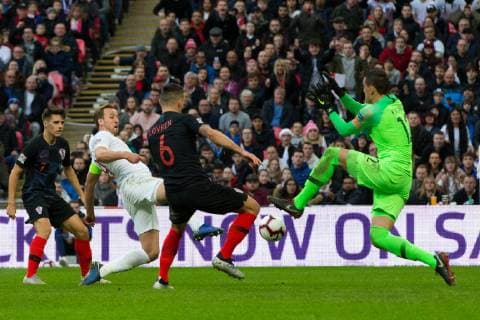 Harry Kane of England shoots past Lovre Kalinic of Croatia to set up his side s first goal during the UEFA Nations League match at Wembley Stadium, London. Picture date: 18th November 2018. Picture credit should read: Craig Mercer Sportimage EDITORIAL USE ONLY. No use with unauthorised audio, video, data, fixture lists, club league logos or live services. Online in-match use limited to 120 images, no video emulation. No use in betting, games or single club league player publications. EH9R1782.CR2