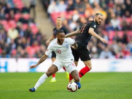(181119) -- LONDON, Nov, 19 2018 -- Raheem Sterling (L) of England vies with Marcelo Brozovic of Croatia during League A Group 4 match of UEFA Nations League between England and Croatia at the Wembley Stadium in London, Britain on Nov. 18, 2018. England won 2-1. ) (SP)BRITAIN-LONDON-FOOTBALL-UEFA NATIONS LEAGUE-ENGLAND VS CROATIA MarekxDorcik 
