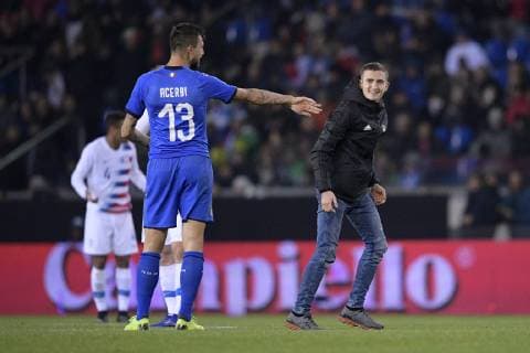 Italian Francesco Acerbi and an Italian supporter pictured during a friendly soccer game between Italy and USA in Genk, Tuesday 20 November 2018. YORICKxJANSENS  x05473686x