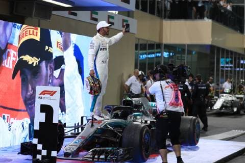 25th November 2018, Yas Marina, Abu Dhabi, United Arab Emirates; Etihad Airways Formula 1 Grand Prix of Abu Dhabi, race day; Mercedes AMG Petronas Motorsport, Lewis Hamilton wins the race and celebrates with team in parc ferme for his 11th season win  ActionPlus12083014 Octane