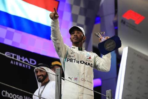 25th November 2018, Yas Marina, Abu Dhabi, United Arab Emirates; Etihad Airways Formula 1 Grand Prix of Abu Dhabi, race day; Mercedes AMG Petronas Motorsport, Lewis Hamilton wins the race and receives the trophy  ActionPlus12083016 Octane