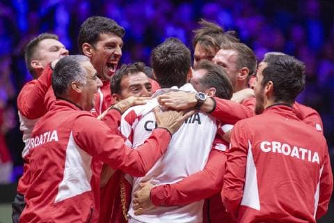 (181126) -- LILLE, Nov. 26, 2018 (Xinhua) -- The Croatian team members celebrate their victory in Lille, France on Nov. 25, 2018. Marin Cilic of Croatia won 3-0 in the 4th match of the final of the Davis Cup against Lucas Pouille of France, making Croatia claim the title by 3-1. (Xinhua Eugene Pradier) (SP)FRANCE-LILLE-TENNIS-DAVIS CUP-FINAL-4TH MATCH 