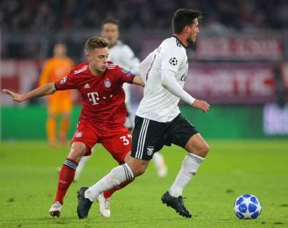 SOCCER - UEFA CL, Bayern vs Benfica MUNICH,GERMANY,27.NOV.18 - SOCCER - UEFA Champions League, FC Bayern Muenchen vs Benfica Lissabon. Image shows Joshua Kimmich (Bayern) and Gabriel (Benfica). GEPAxpictures xThomasxBachun