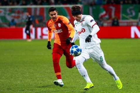 MOSCOW, RUSSIA â€“ NOVEMBER 28, 2018: Galatasaray Istanbulâ€™s Ozan Kabak (L) and Lokomotiv Moscowâ€™s Fyodor Smolov in their 2018 19 UEFA Champions League Group G Round 5 football match at RZD Arena. Sergei Fadeichev TASS  TS099223