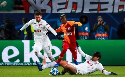 MOSCOW, RUSSIA â€“ NOVEMBER 28, 2018: Lokomotiv Moscowâ€™s Grzegorz Krychowiak (L), Vedran Corluka (R), and Galatasaray Istanbulâ€™s Henry Onyekuru in their 2018 19 UEFA Champions League Group D Round 5 football match at RZD Arena; Lokomotiv Moscow won 2-0. Sergei Fadeichev TASS  TS099272