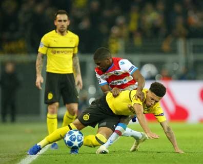 28.11.2018, Fussball UEFA Champions League 2018 2019, Gruppenphase, 5.Spieltag, Borussia Dortmund - FC Brügge, im Signal-Iduna-Park Dortmund. (L-R) Jadon Sancho (Dortmund) gegen Wesley (FC Brügge)