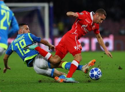 28th November 2018, Stadio San Paolo, Naples, Italy; UEFA Champions League football, Napoli versus Red Star Belgrade; Nikola Maksimovic of Napoli with a slide tackle  ActionPlus12083783 NaFoto