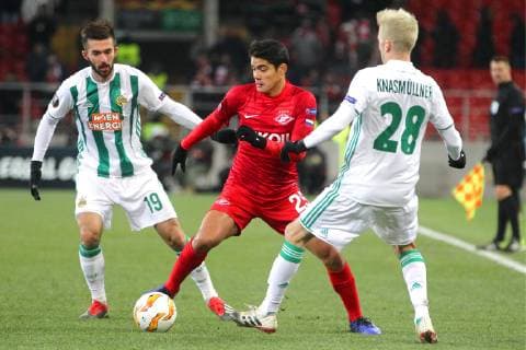 MOSCOW, RUSSIA - NOVEMBER 29, 2018: Rapid Vienna s Marvin Potzmann (L), Christoph Knasmullner (R), and Spartak Moscow s Lorenzo Melgarejo (C) in action in their 2018 19 UEFA Europa League Group G Round 5 football match at Otkrytie Arena. Sergei Bobylev TASS  TS099470