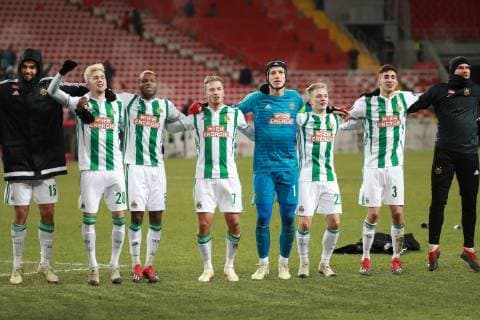 MOSCOW, RUSSIA - NOVEMBER 29, 2018: Rapid Vienna s Manuel Martic, Christoph Knasmullner, Boli Bolingoli-Mbombo, Philipp Schobesberger, goalkeeper Richard Strebinger, Manuel Thurnwald, and Mert Muldur (L-R) celebrate their victory in the 2018 19 UEFA Europa League Group G Round 5 football match against Spartak Moscow at Otkrytie Arena. Sergei Fadeichev TASS  TS09948A