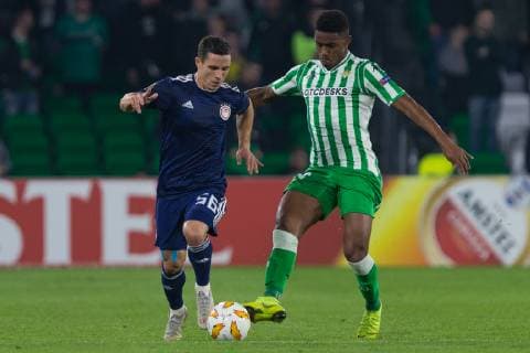 29th November 2018, Estadio Benito Villamarin, Seville, Spain; UEFA Europa League football, Real Betis versus Olympiakos; Daniel Podence of Olympiacos breaks forward under pressure from Junior of Real Betis  ActionPlus12083905 AntonioxGomez
