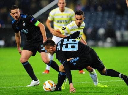 Baris Alici of Fenerbahce and Arijan Ademi 5 , Emir Dilaver 66 of Dinamo Zagreb during the UEFA Europa League groupD match between Fenerbahce and Dinamo Zagreb at Ulker Stadium in Istanbul , Turkey on November 29 , 2018. 