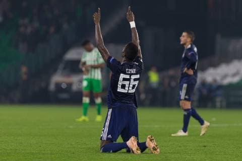 29th November 2018, Estadio Benito Villamarin, Seville, Spain; UEFA Europa League football, Real Betis versus Olympiakos; Pape Abou Cisse of Olympiacos prays after finishing the match  ActionPlus12083933 AntonioxGomez