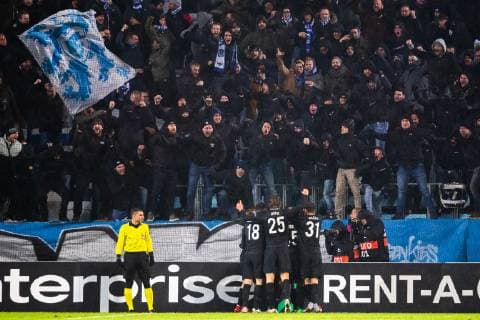 181129 Supporters of Genk celebrates infront of supporters after 0-2 during the Europa league match between Malmö FF and Genk on November 29, 2018 in Malmö. Photo: Petter Arvidson BILDBYRN kod PA 92161  Copyright: PETTERxARVIDSON BB181129PA035