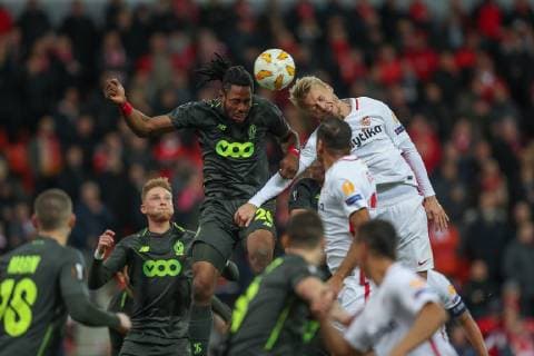 Standard s Christian Luyindama Nekadio and Sevilla s defender Simon Kjaer fight for the ball during the match between Belgian soccer team Standard de Liege and Spanish club Sevilla, in Liege, Thursday 29 November 2018 on the fifth day of the UEFA Europa League group stage, in group J. BRUNOxFAHY  x05479608x