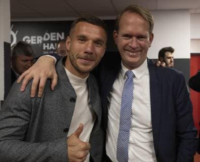 Pressekonferenz Handball WM 2019 Kabine Lanxess Arena Koeln Deutschland Datum: 03.12.2018 Links: Lukas Podolski Rechts: Stefan Löcher