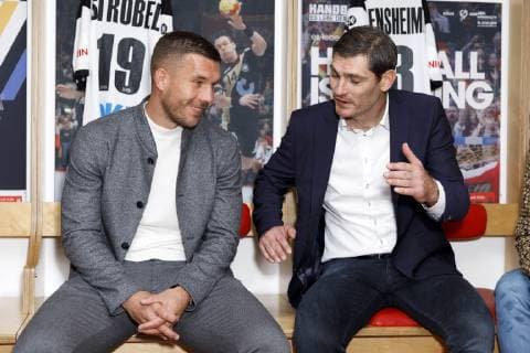 Henning Fritz und Lukas Podolski bei der Pressekonferenz zur Handball WM 2019 Handball Is Coming Home in der WM-Kabine von 2007 in der Lanxess-Arena. Köln, 03.12.2018