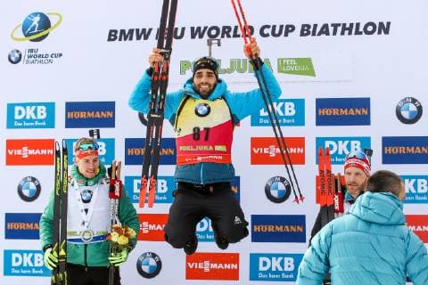 BIATHLON - IBU World Cup POKLJUKA,SLOVENIA,06.DEC.18 - BIATHLON - IBU World Cup, 20km individual competition, men, award ceremony. Image shows Johannes Kuehn (GER), the rejoicing of Martin Fourcade (FRA) and Simon Eder (AUT). GEPAxpictures xMaticxKlansek