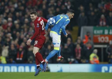 Andrew Robertson of Liverpool challenges Jose Callejon of Napoli during the UEFA Champions League Group C match at Anfield Stadium, Liverpool. Picture date 11th December 2018. Picture credit should read: Andrew Yates Sportimage EDITORIAL USE ONLY. No use with unauthorised audio, video, data, fixture lists, club league logos or live services. Online in-match use limited to 120 images, no video emulation. No use in betting, games or single club league player publications. _AY20114.JPG