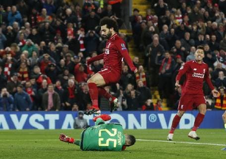 Mohamed Salah of Liverpool jumps over David Ospina of Napoli as he collects the ball during the UEFA Champions League Group C match at Anfield Stadium, Liverpool. Picture date 11th December 2018. Picture credit should read: Andrew Yates Sportimage EDITORIAL USE ONLY. No use with unauthorised audio, video, data, fixture lists, club league logos or live services. Online in-match use limited to 120 images, no video emulation. No use in betting, games or single club league player publications. _AY19075.JPG
