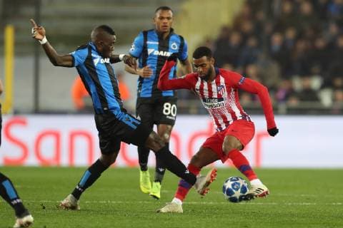 Club s Marvelous Nakamba and Atletico s Thomas Lemar fight for the ball during a game between Belgian soccer team Club Brugge KV and Spanish club Athletico Madrid, in Brugge, Tuesday 11 December 2018, on the sixth and last day of the UEFA Champions League, in the group A. BRUNOxFAHY  x05488093x