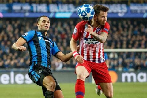 Club s Sofyan Amrabat and Atletico s Saul Niguez Esclapez fight for the ball during a game between Belgian soccer team Club Brugge KV and Spanish club Athletico Madrid, in Brugge, Tuesday 11 December 2018, on the sixth and last day of the UEFA Champions League, in the group A. KURTxDESPLENTER  x05488149x