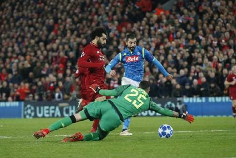 Mohamed Salah of Liverpool goes past David Ospina of Napoli but fails to score during the UEFA Champions League Group C match at Anfield Stadium, Liverpool. Picture date 11th December 2018. Picture credit should read: Andrew Yates Sportimage EDITORIAL USE ONLY. No use with unauthorised audio, video, data, fixture lists, club league logos or live services. Online in-match use limited to 120 images, no video emulation. No use in betting, games or single club league player publications. _AY19212.JPG