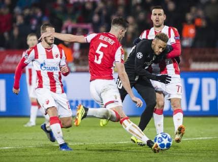 11th December 2018, Rajko Mitic Stadium, Belgrade, Serbia; UEFA Champions League football, Red Star Belgrade versus Paris Saint-Germain; Neymar of Paris Saint-Germain tackled by Milos Degenek and Marko Gobeljic of Red Star Belgrade  ActionPlus12086892 NikolaxKrstic