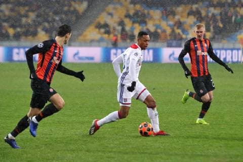 Defender Kenny Tete (C) of Olympique Lyonnais (Lyon) is seen in action with midfielders Taras Stepanenko (L) and Viktor Kovalenko of FC Shakhtar Donetsk during the UEFA Champions League Group F Matchday 6 game at the NSC Olimpiyskiy, Kyiv, capital of Ukraine, December 12, 2018. Ukrinform. UCL: Shakhtar vs Lyon in Kyiv  Copyright: xPavlo_Bagmutx