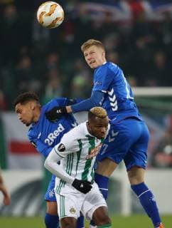 SOCCER - UEFA EL, Rapid vs Rangers VIENNA,AUSTRIA,13.DEC.18 - SOCCER - UEFA Europa League, group stage, SK Rapid Wien vs Glasgow Rangers. Image shows James Tavernier (Rangers), Boli Bolingoli-Mbombo (Rapid) and Ross McCrorie (Rangers). Keywords: Wien Energie. GEPAxpictures xMarioxKneisl