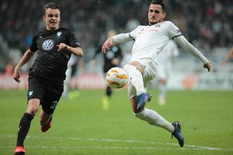 Mustafa Pektemek (R) of Besiktas and Andreas Vindheim (L) of Malmo during the UEFA Europa League match between Besiktas and Malmo at Vodafone Park in Istanbul , Turkey on December 13 , 2018. 
